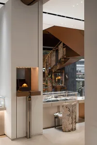 An elegant retail shop showcasing brass accents and modern design.