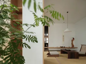 Modern minimalist living room with paper tiles, wood furniture, and a glass pendant light.