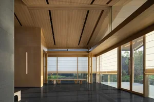 A modern lobby with marble and wooden finishes