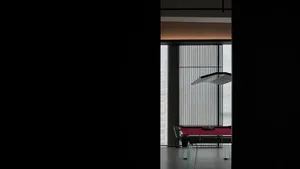 Modern office lounge featuring metallic furniture and decor.