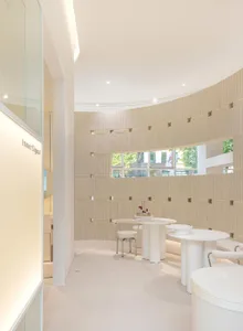 White and concrete minimalist coffee shop interior design