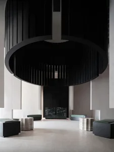 Modern interior design featuring marble, concrete, and metal elements