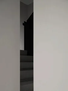 A minimalist stairwell constructed of concrete.