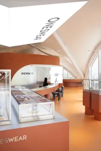A modern retail jewelry shop featuring a glass display counter.