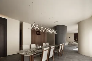 Modern interior design featuring a marble dining table and chairs, with a contemporary living area in the background.