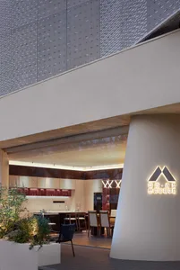Modern urban retail space with metal and glass materials.