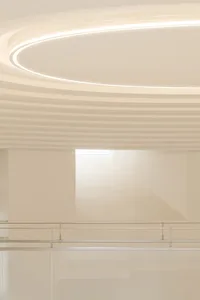 A modern interior space featuring glass ceiling for aesthetic and functional purposes in a contemporary design setting.
