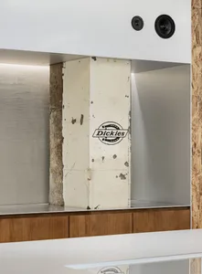Industrial-style retail storefront with concrete walls and ceiling