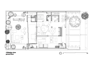 A 2D architectural drawing of a modern retail space.