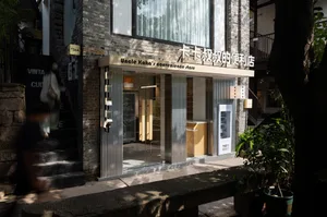 Modern convenience store with brick facade and glass front