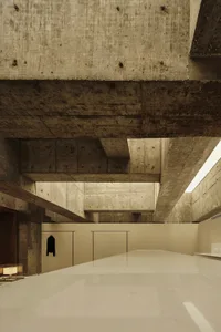 Modern minimalist interior featuring concrete and marble materials.