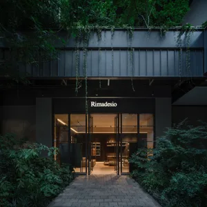 Modern retail storefront adorned with glass and concrete materials