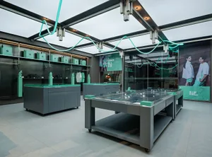 Modern retail storefront featuring contemporary glass and metal design elements.