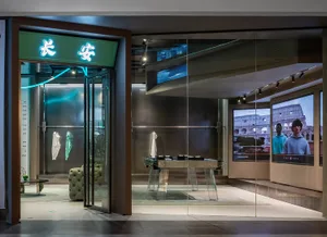 Modern retail storefront featuring glass design elements.