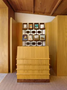 A modern storefront with a wooden interior design.