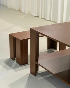 A modern table and benches made of wood.