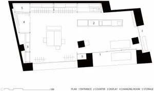 Shop interior layout plan showing furniture arrangement and storage areas.
