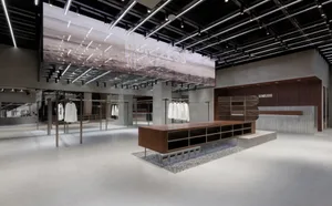 Modern retail storefront with concrete ceiling and minimalist design
