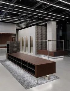 Modern retail space featuring marble details and wooden shelves.