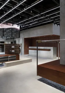 Modern industrial office space with metal and wood elements.