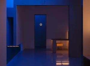 Minimalist modern interior with concrete walls and light wood accents