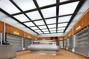 Modern retail space with empty shelves. The shelves are made of metal and wood.