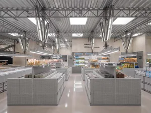 A modern shopping mall interior with metal elements