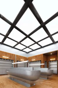 Modern, minimalist supermarket checkout counter with metallic surfaces and wooden accents.