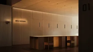 Minimalist office space with wooden furniture and walls