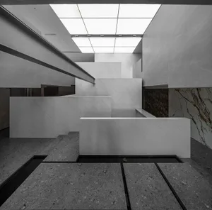 A modern office space with marble floor tiles.