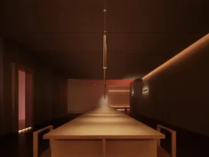 簡約風格的餐廳室內，擺放一張長形木桌，並搭配現代燈具。