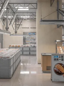 Modern retail store interior with metal shelves and concrete pillars