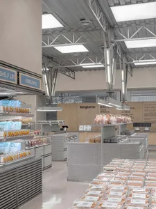 Industrial-designed store interior with metal and concrete elements.