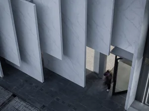 Modern building exterior with marble panels and glass windows