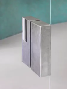 modern metal handle on a glass door
