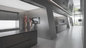 A modern metallic kitchen with sleek, minimalist design.