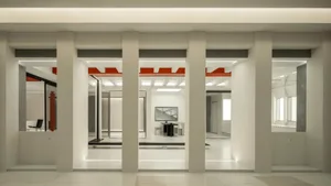 Modern office space featuring concrete and glass materials.