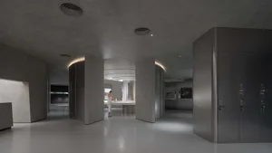 Minimalist interior space with modern, concrete finishes.