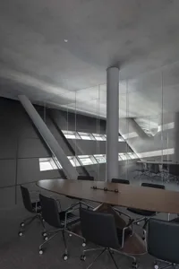 Modern conference room with glass walls and concrete floor.
