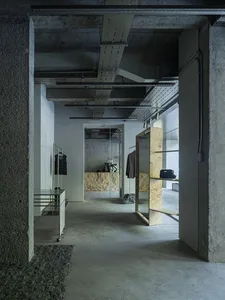 Minimalist retail space with concrete walls and floors