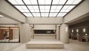 Modern lobby designed with concrete elements and open layout.