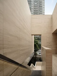 Modern interior design with concrete walls and minimalist design elements.