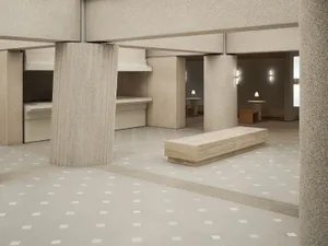 A modern minimalist lobby space featuring concrete materials.