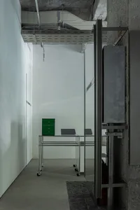 Modern office interior with concrete and metal materials.