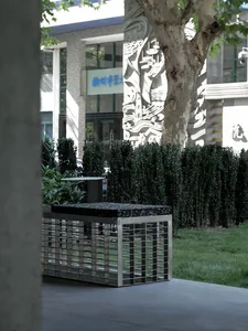 Modern metal and grass furnishings in an outdoor relaxation space
