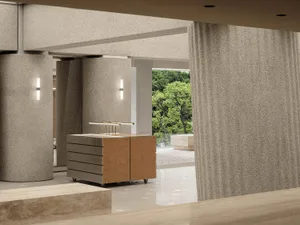 An interior commercial space featuring modern design elements and concrete materials.