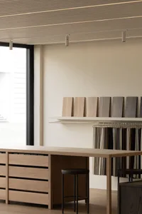 Various wood and textile samples arranged in an interior design setting.