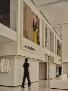 A minimalist retail store featuring white marble.