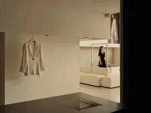 A retail space with neutral colors and minimalist decor.
