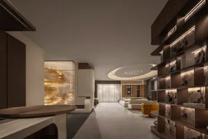 現代簡約客廳，採用石材飾面搭配俐落當代裝飾。